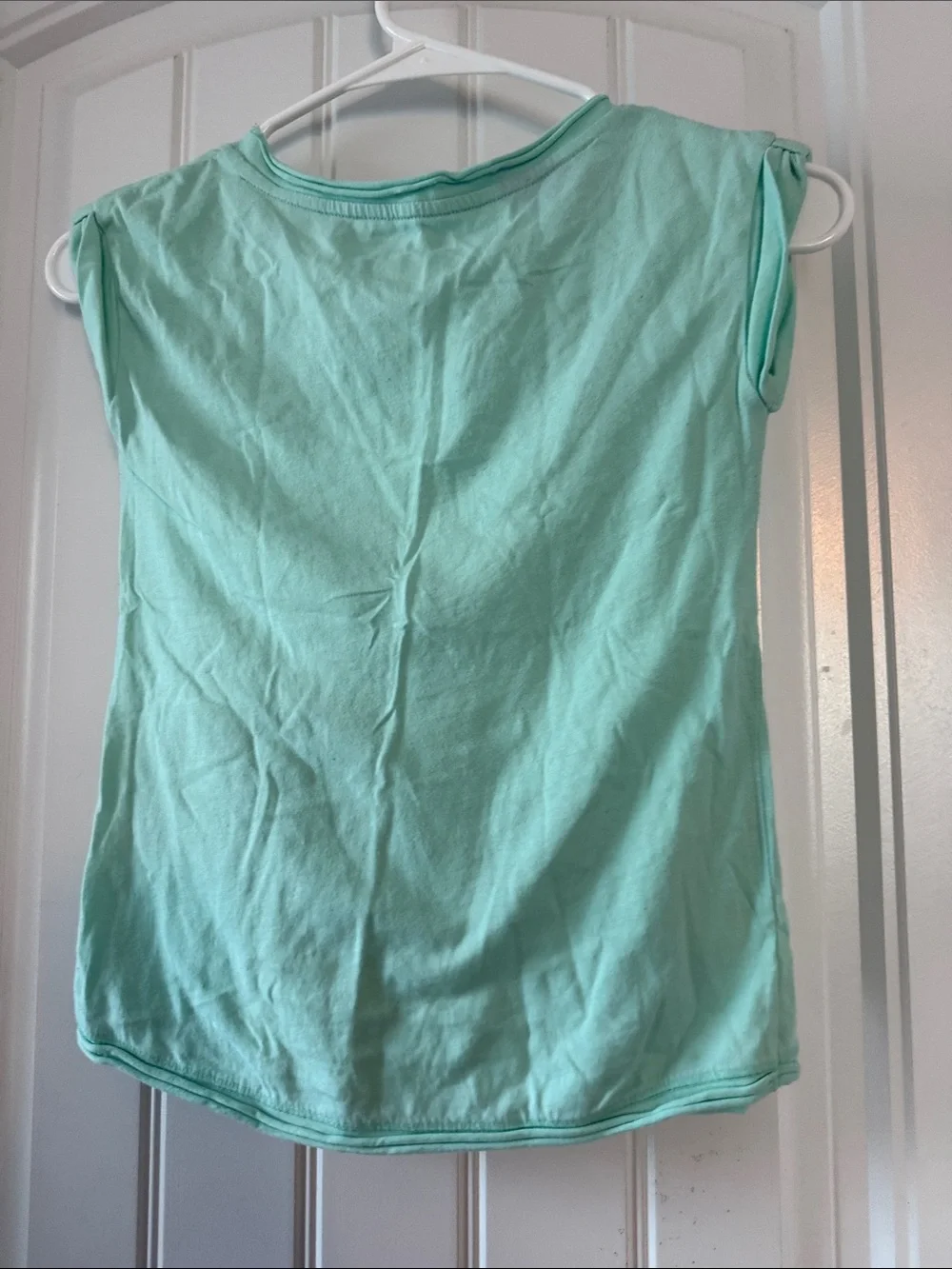 Gently worn Cherokee Mint Bunny Graphic Tee with Navy Floral Skirt Set